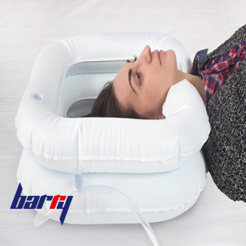 Inflatable headrest for shampooing at Barry store